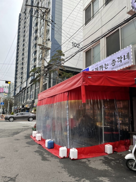 조개까는포차 이미지