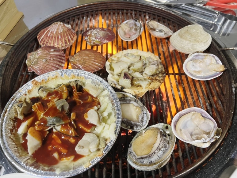 조개까는포차 이미지