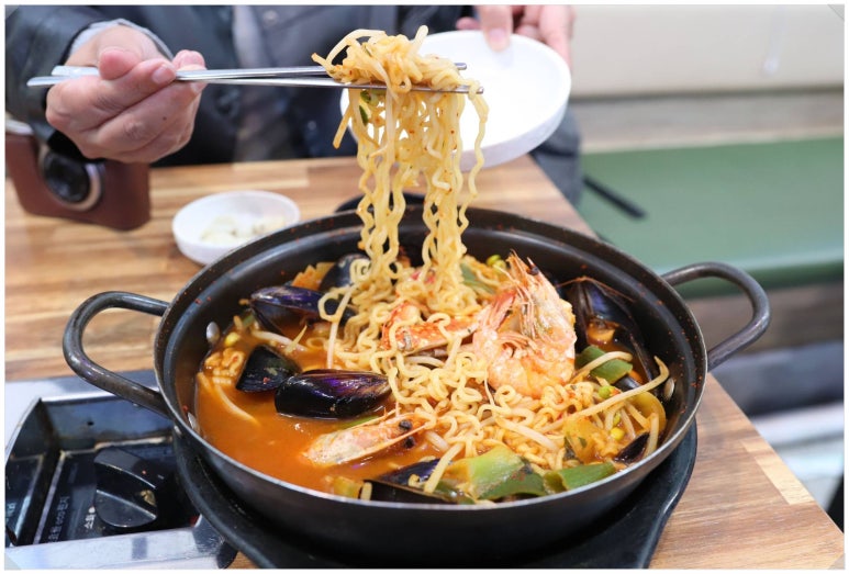 산꼼장어조개구이 이미지