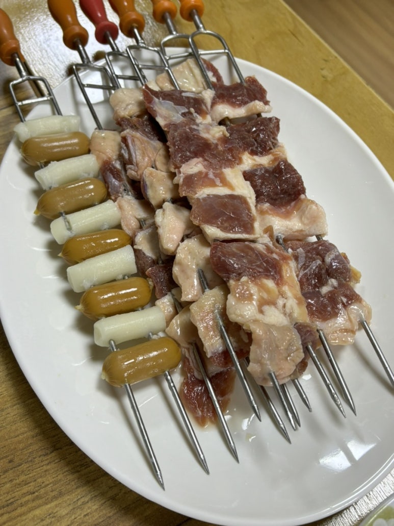 천앤정오리숯불회전구이 이미지