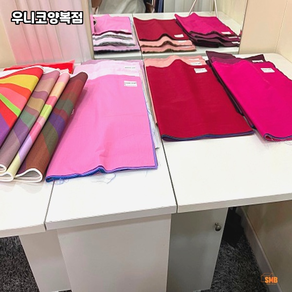 우니코테일러 이미지