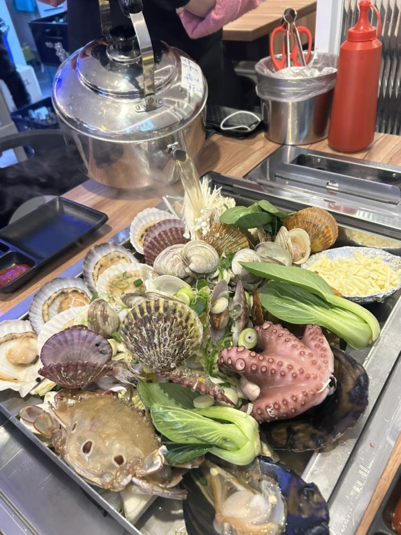 바다수퍼해물천하조개구이성서점 이미지