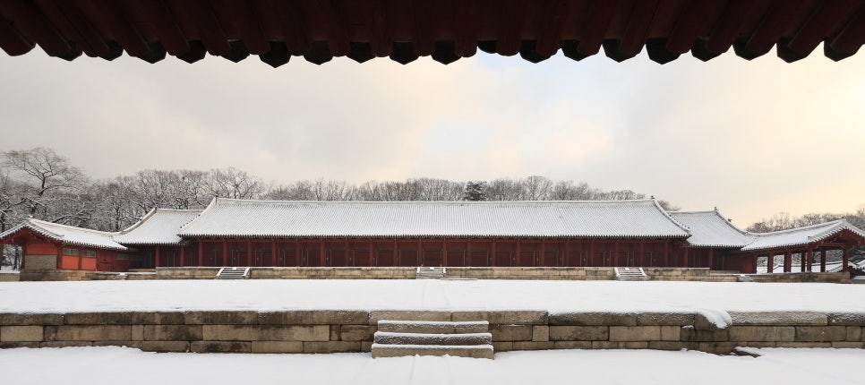 Jeongjeon, the main hall of Jongmyo Shrine: a long wooden building above a broad stone terrace