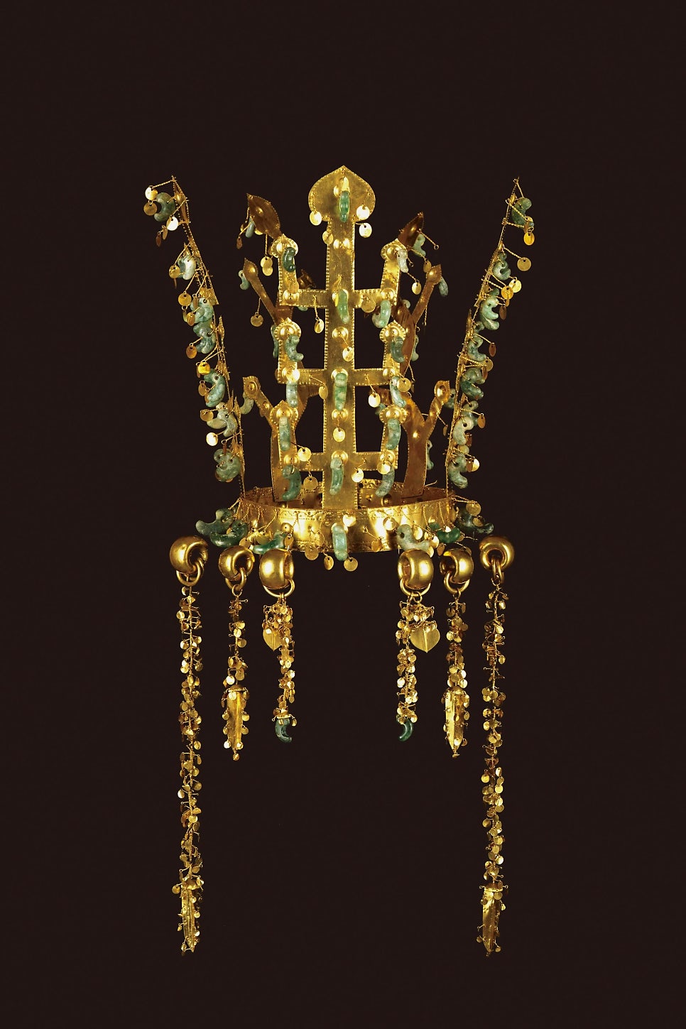 The gold crown from the north mound of Hwangnamdaechong, Silla, against a black background, its branch-shaped uprights hung with small round gold spangles