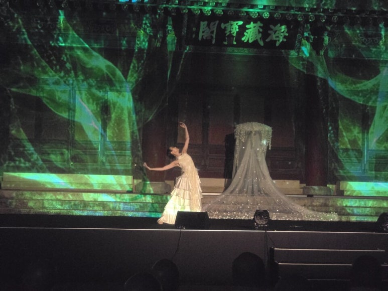 The opening performance on a stage in front of Haejangbogak hall