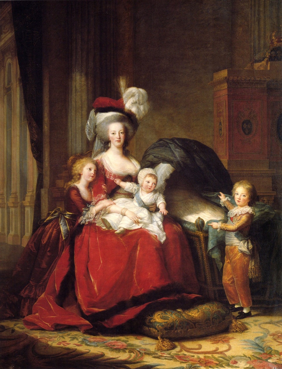 Family portrait of Marie Antoinette in a red dress with her three children