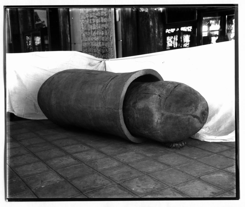 Black-and-white glass plate photograph of a burial jar made of two large jars joined mouth to mouth